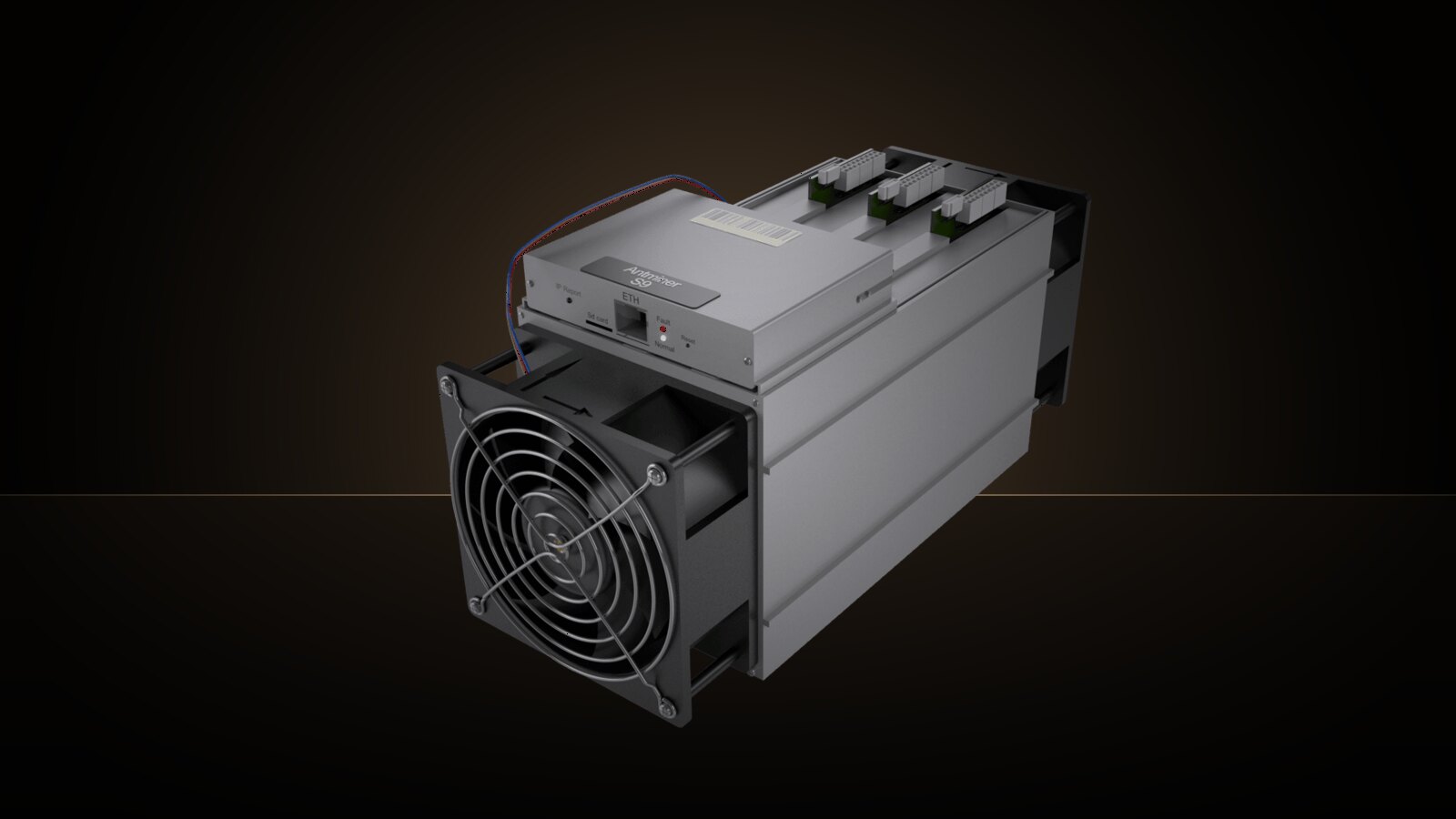 An Antminer S9 against a warm studio backdrop